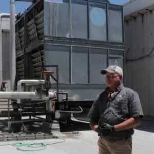 hays employee next to hvac unit