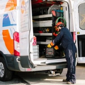 hays employee getting tools from back of hays truck