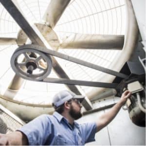 hays employee inspecting fan