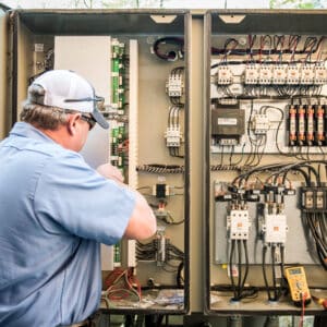 hays employee inspecting wiring